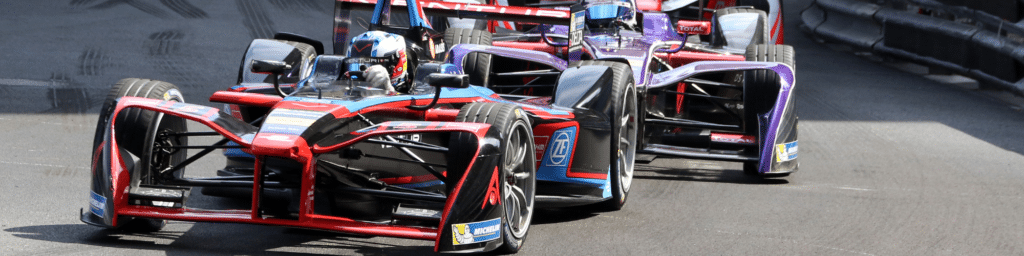 Formula 1 race cars representing the startup accelerator model.